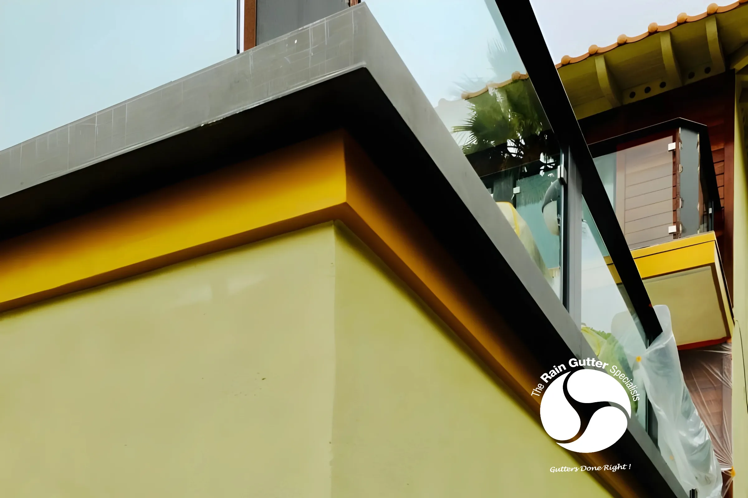 Bonderized box rain gutters installed on a modern home