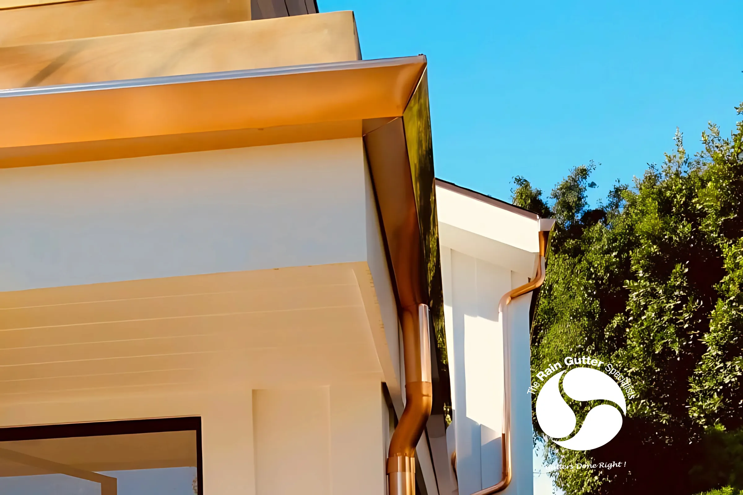 Traditional copper rain gutters installed on a home